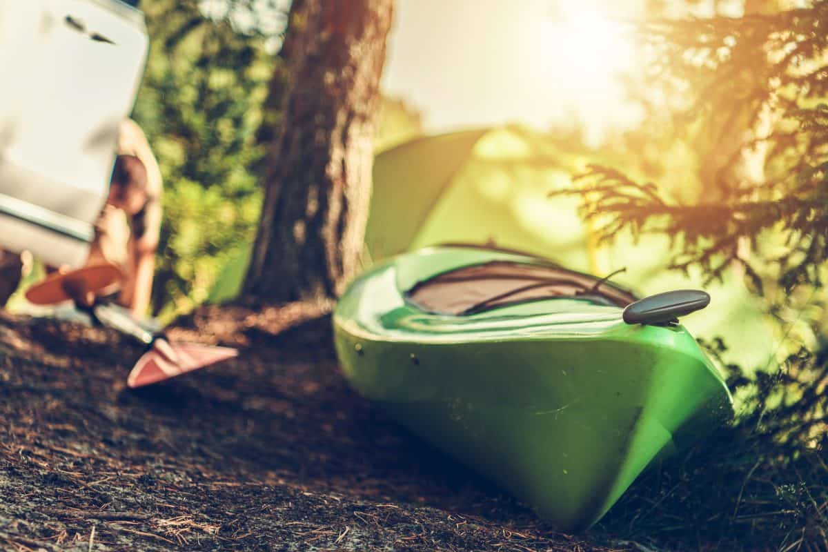 Lifetime kayak on the river bank