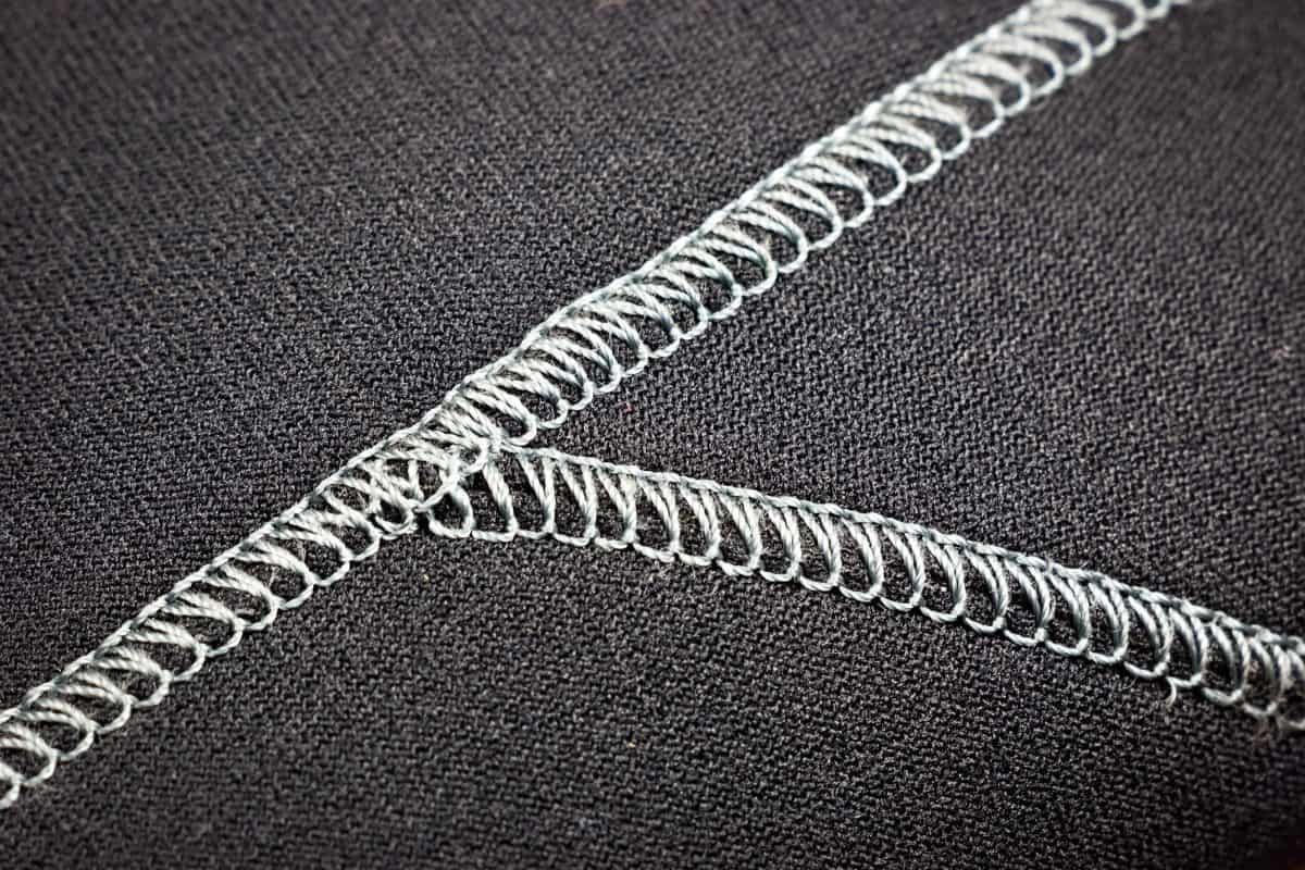 Close-up photo of a stitched seam on a neoprene diving wetsuit