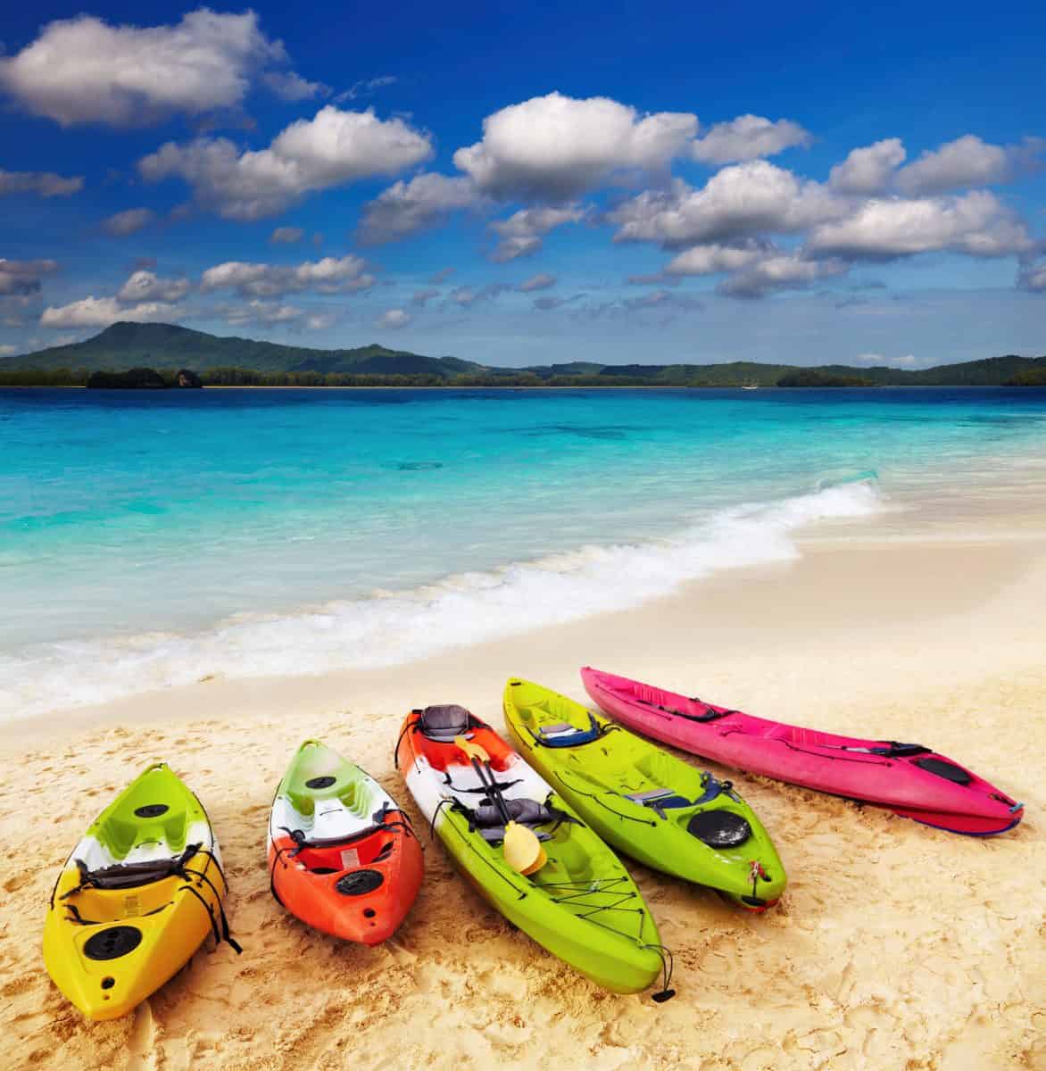 Colorful kayaks on the tropical beach