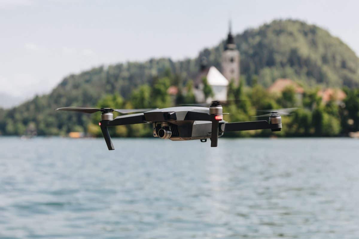 Close-up view of flying drone above mountain lake, bled, slovenia