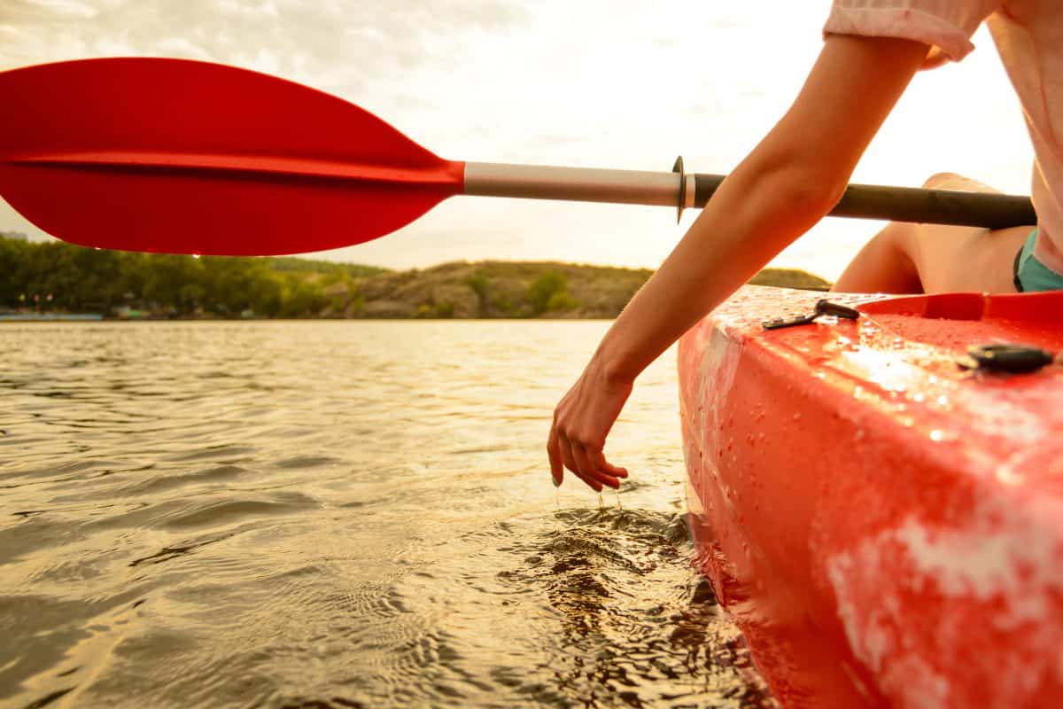 orange paddle close up to show difference between oars and paddles