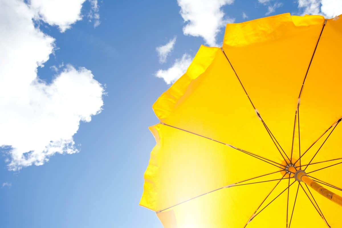 Bimini Top - yellow umbrella on blue sky 