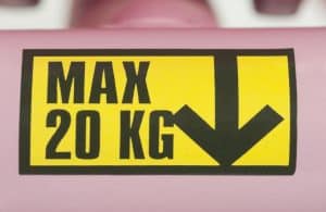 Weight limit sign on a kayak