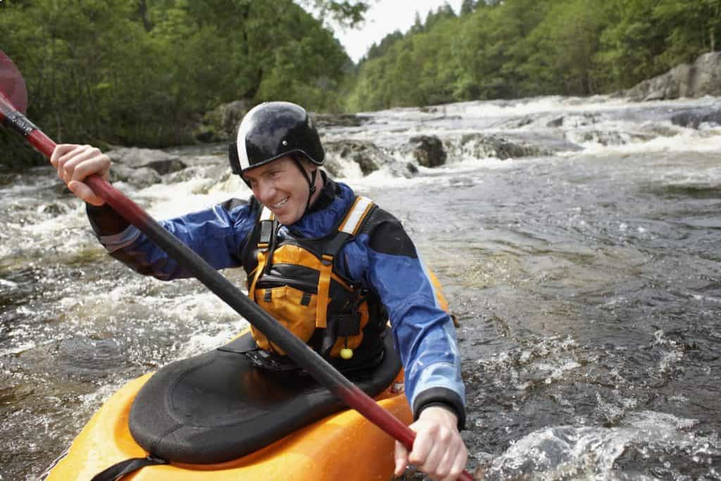 Whitewater Kayaker in drysuit