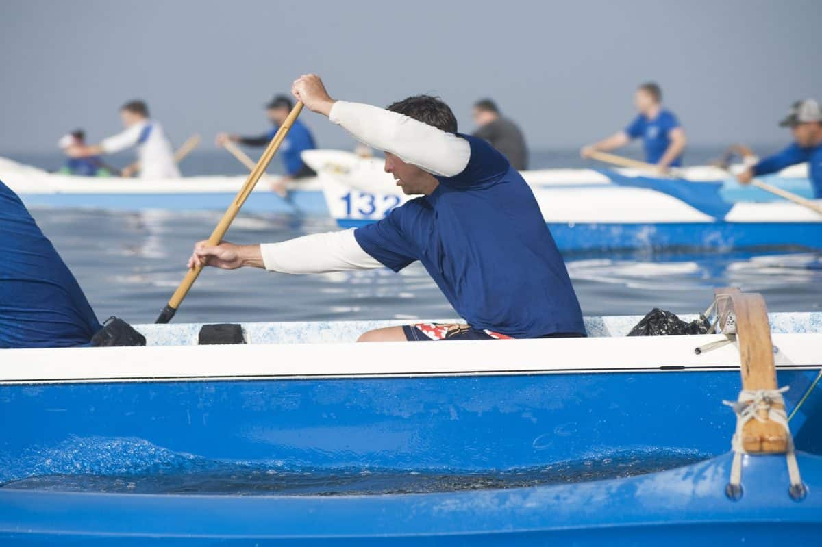 Men paddling in Race Canoe