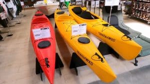 red and two yellow kayaks for sale