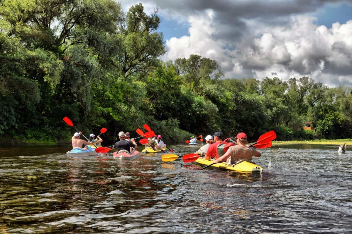 Group of people in best affordable kayaks

