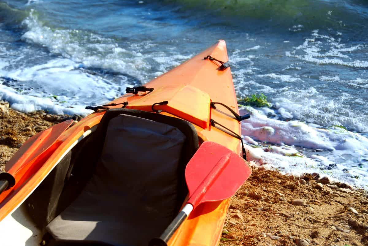 Orange kayak read for test paddle 