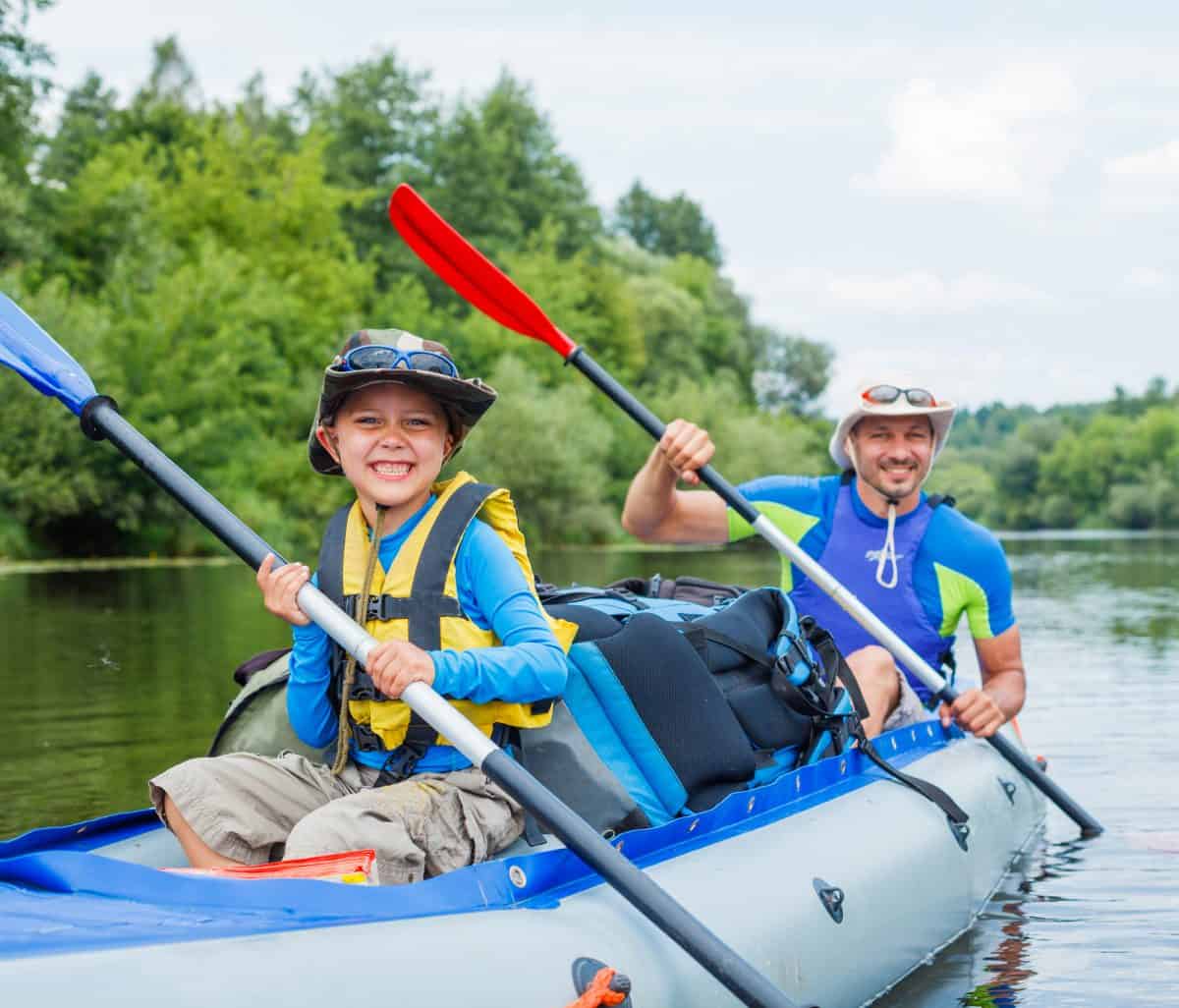 Family in recreational inflatable kayak