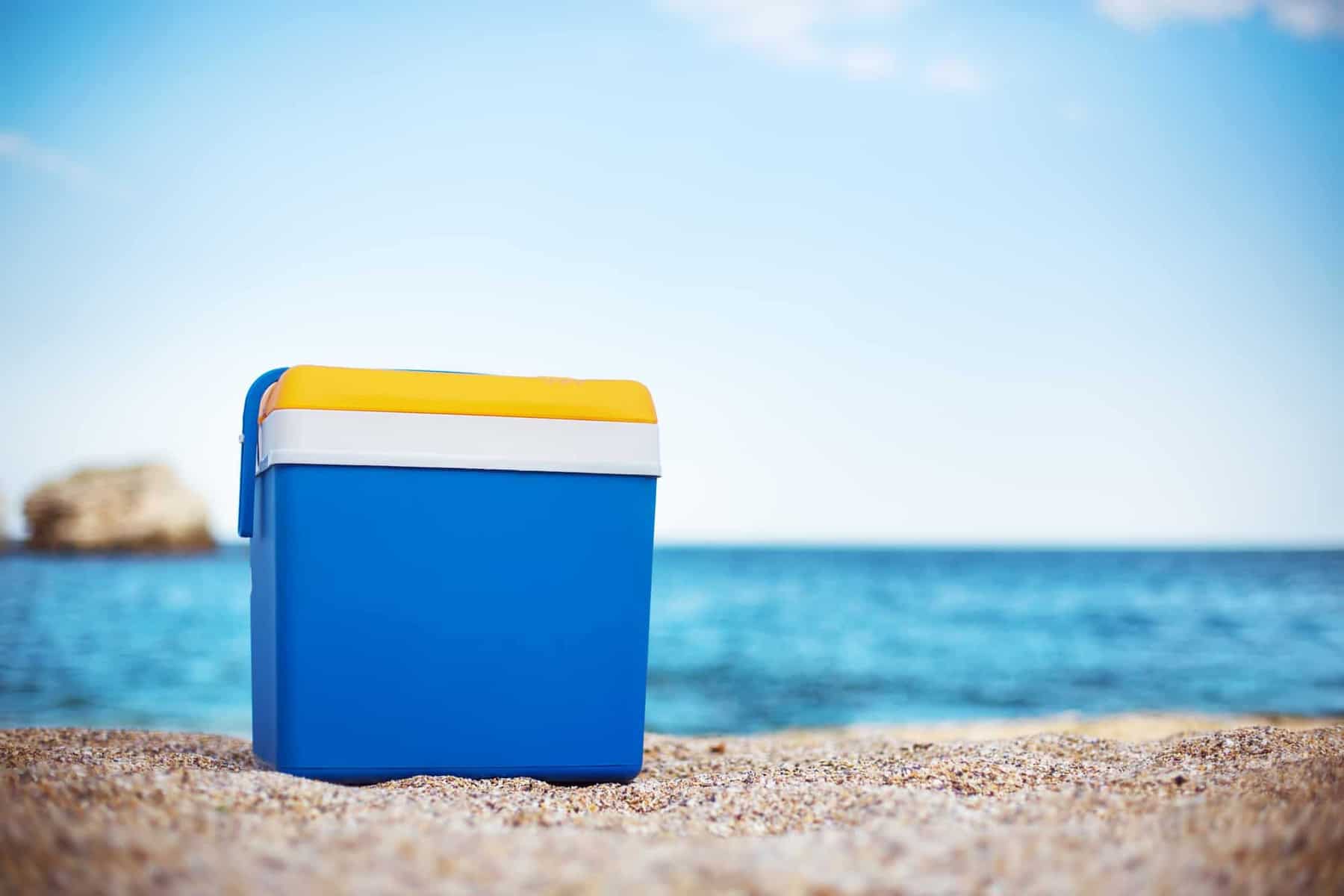 Cooler box on the sea sand