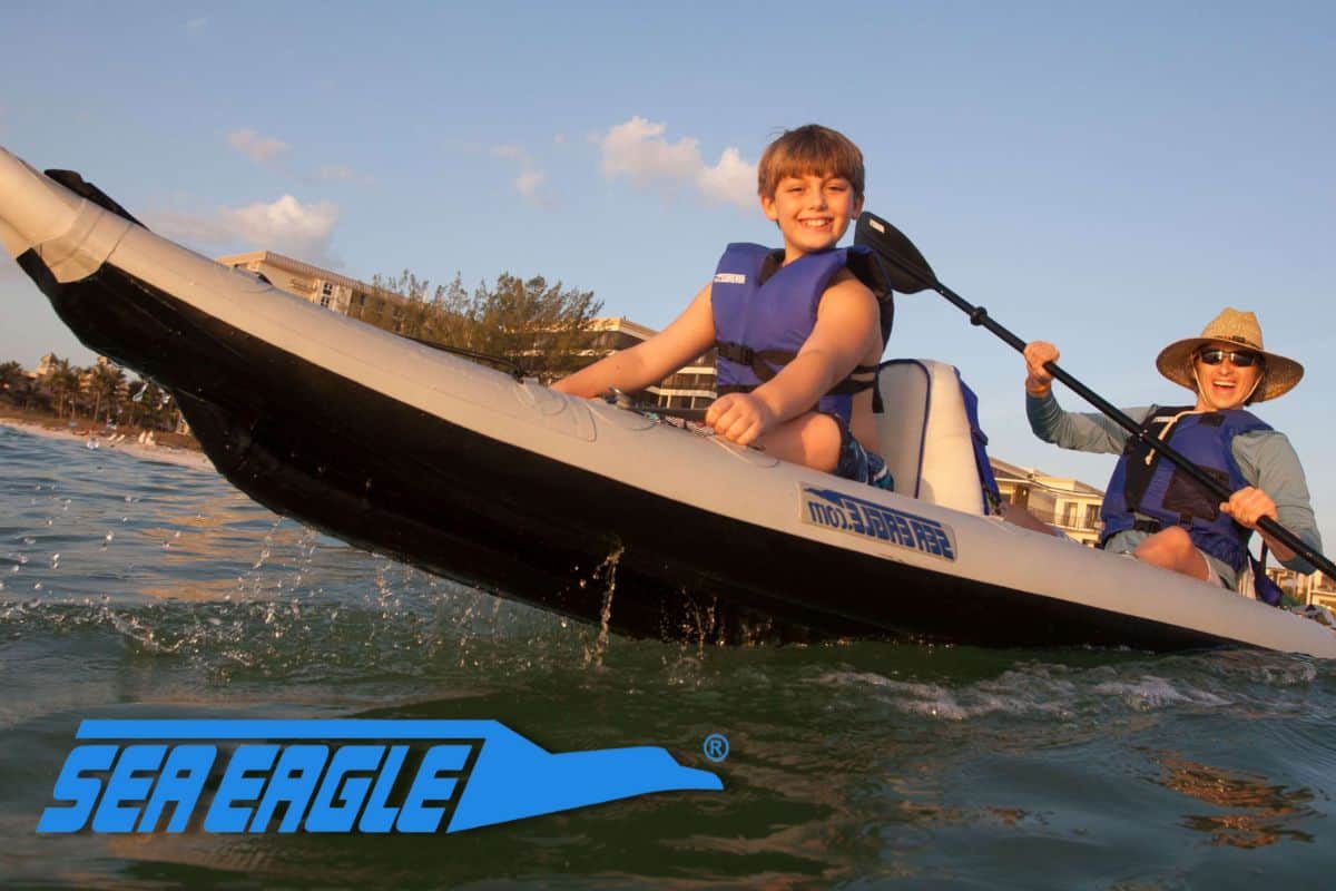 Father and Son In Sea Eagle Inflatable Boat