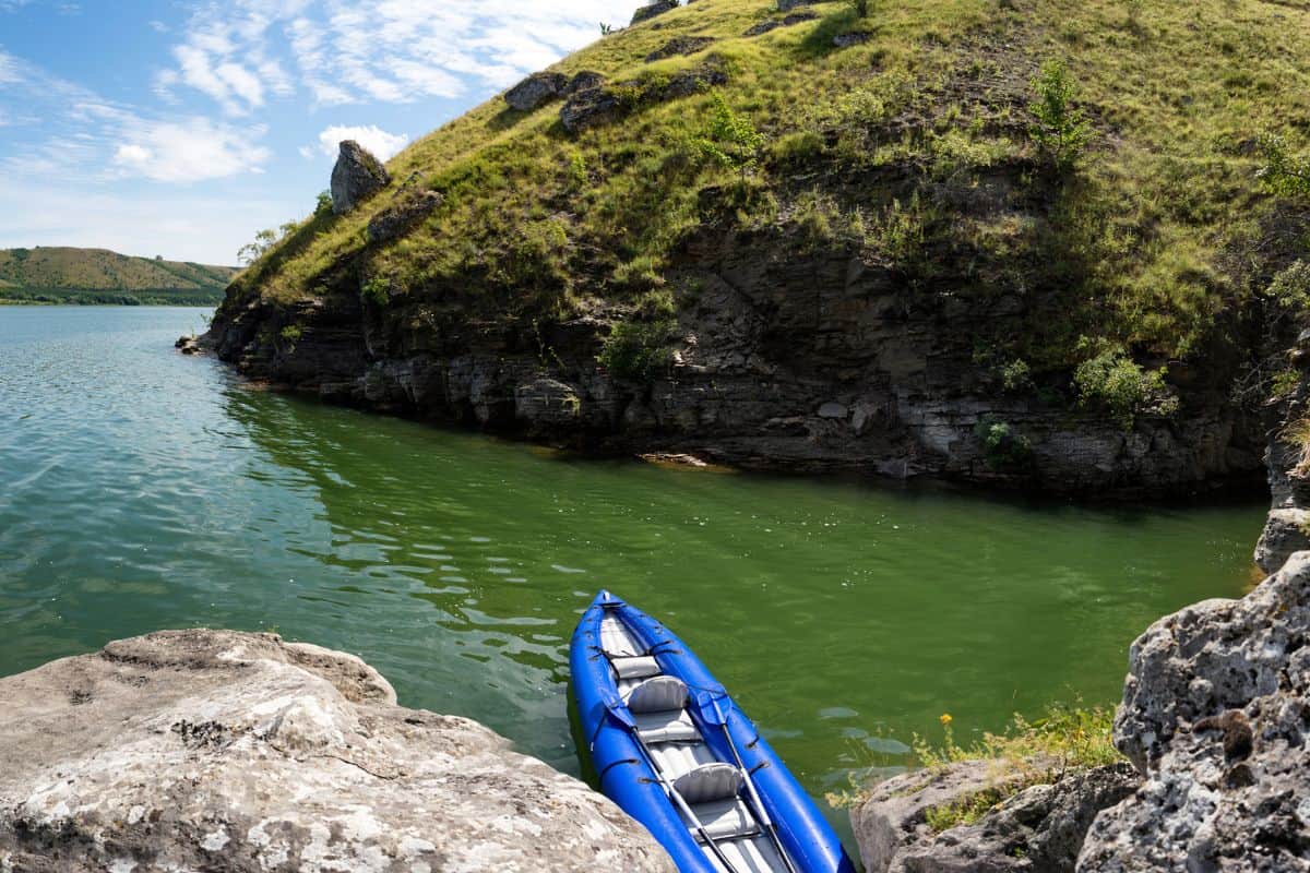 Inflatable tandem kayak with twin inflatable seats on river
