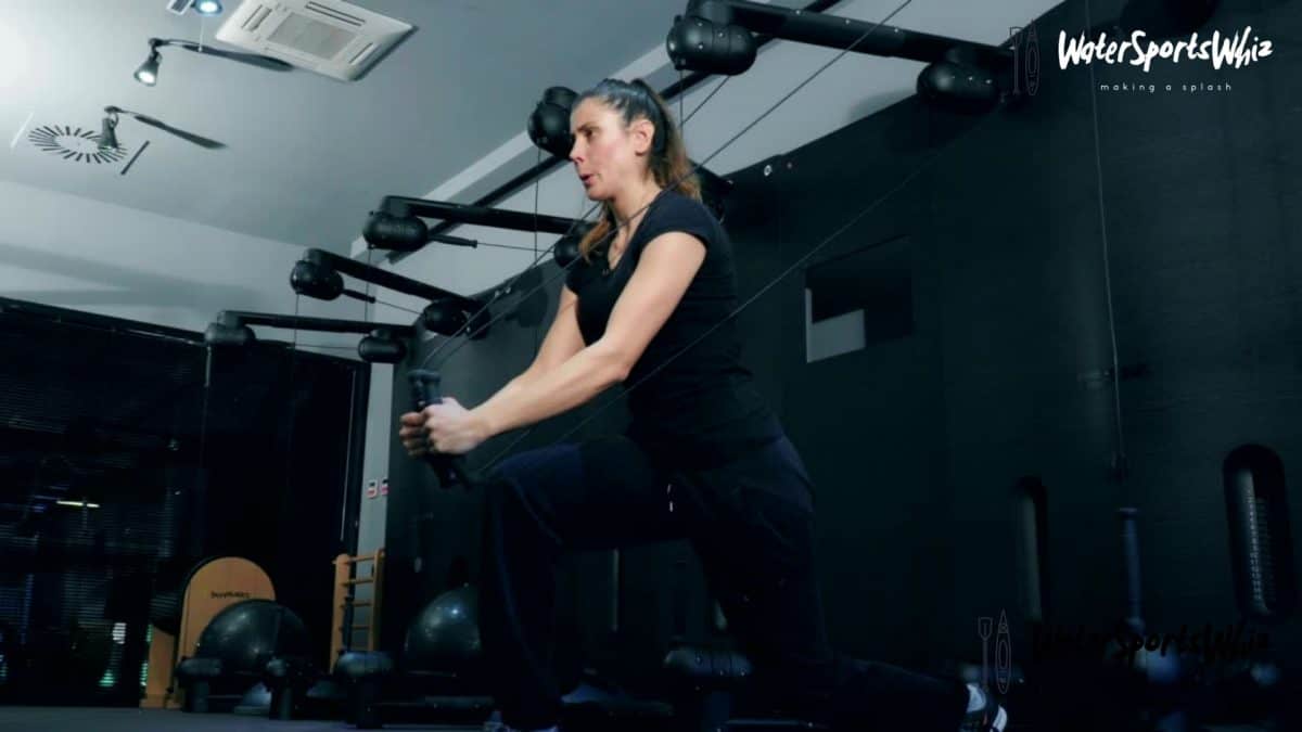 Women performing cable wood chop exercise 