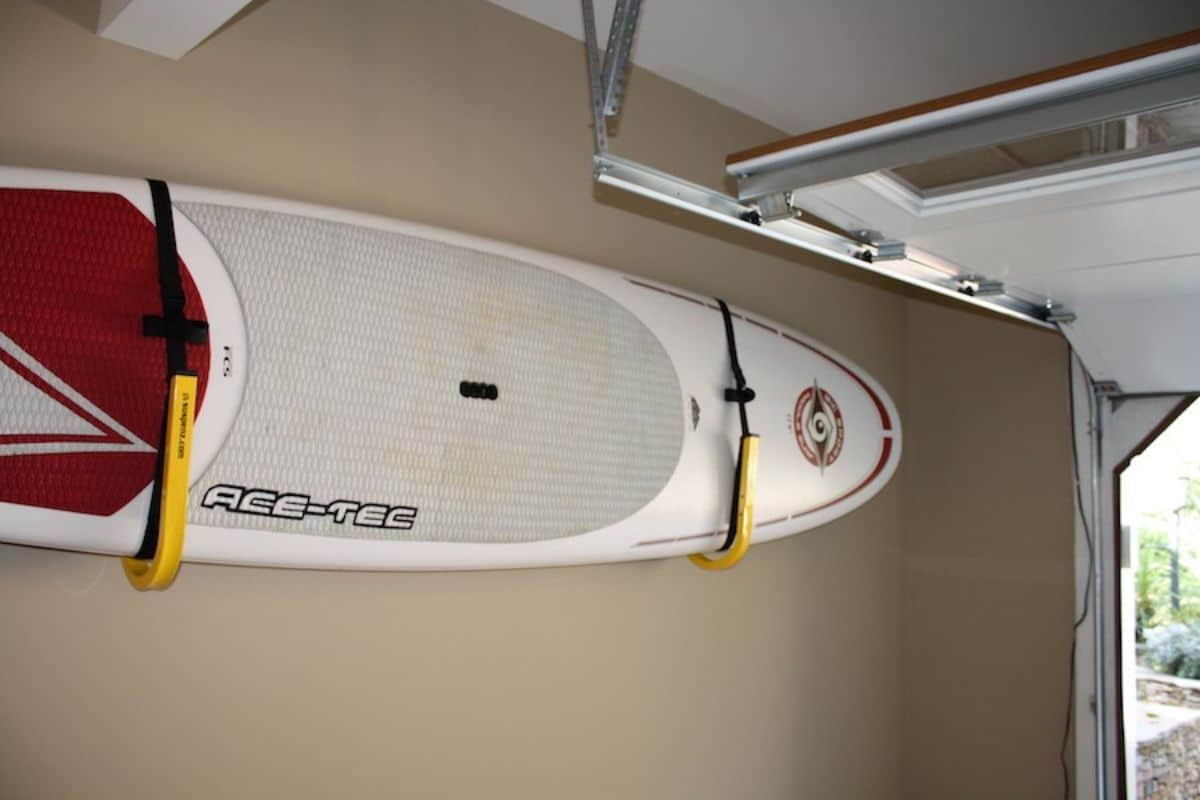 Making the most of storage space with a paddle boarding wall rack