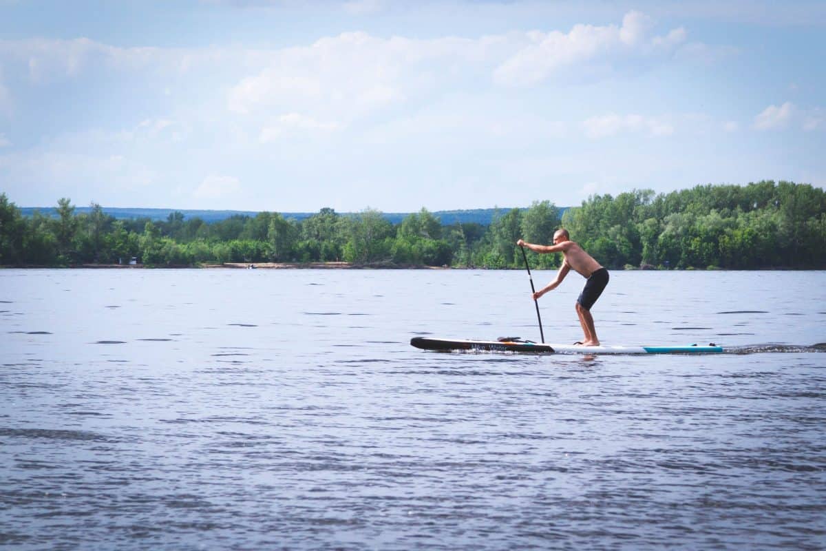 Man getting his morning cardio out on his SUP board