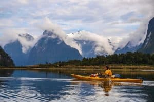 Man Sea kayaking During the Cold Winter Months