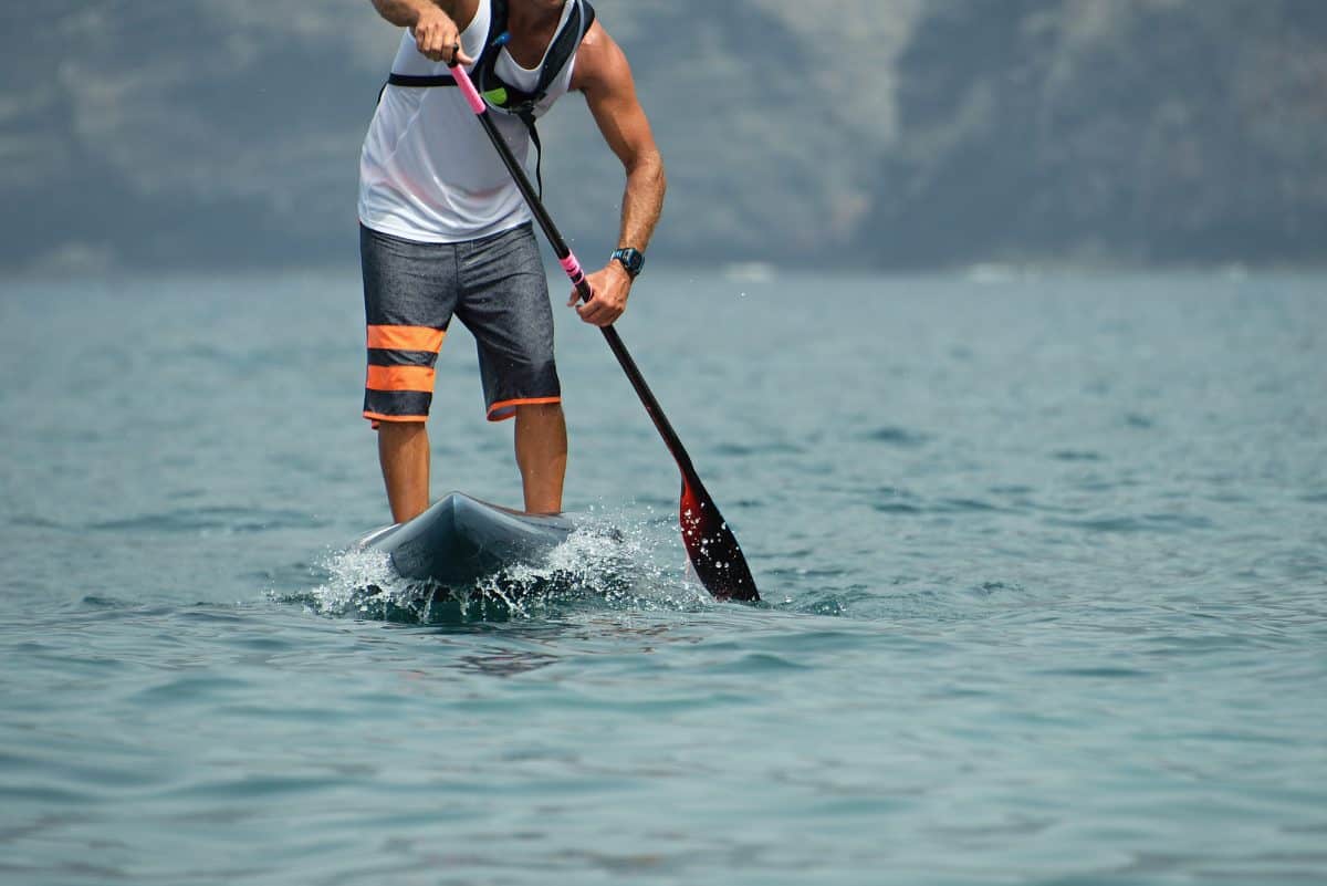 Man Stand Up Paddle Boarding