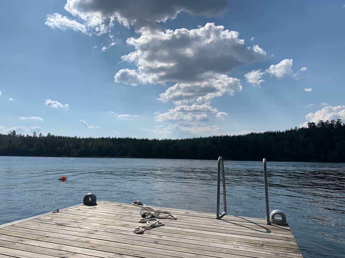 wood jeti dock with step into the lake