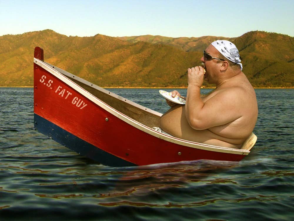Fat man in Kayak