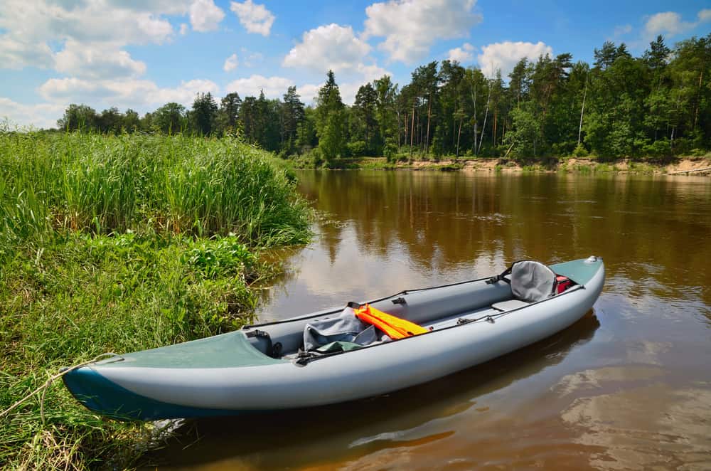 Inflatable lightweight Kayak on the river 