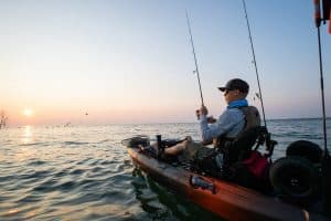 Man in Fishing Kayak on ocean
