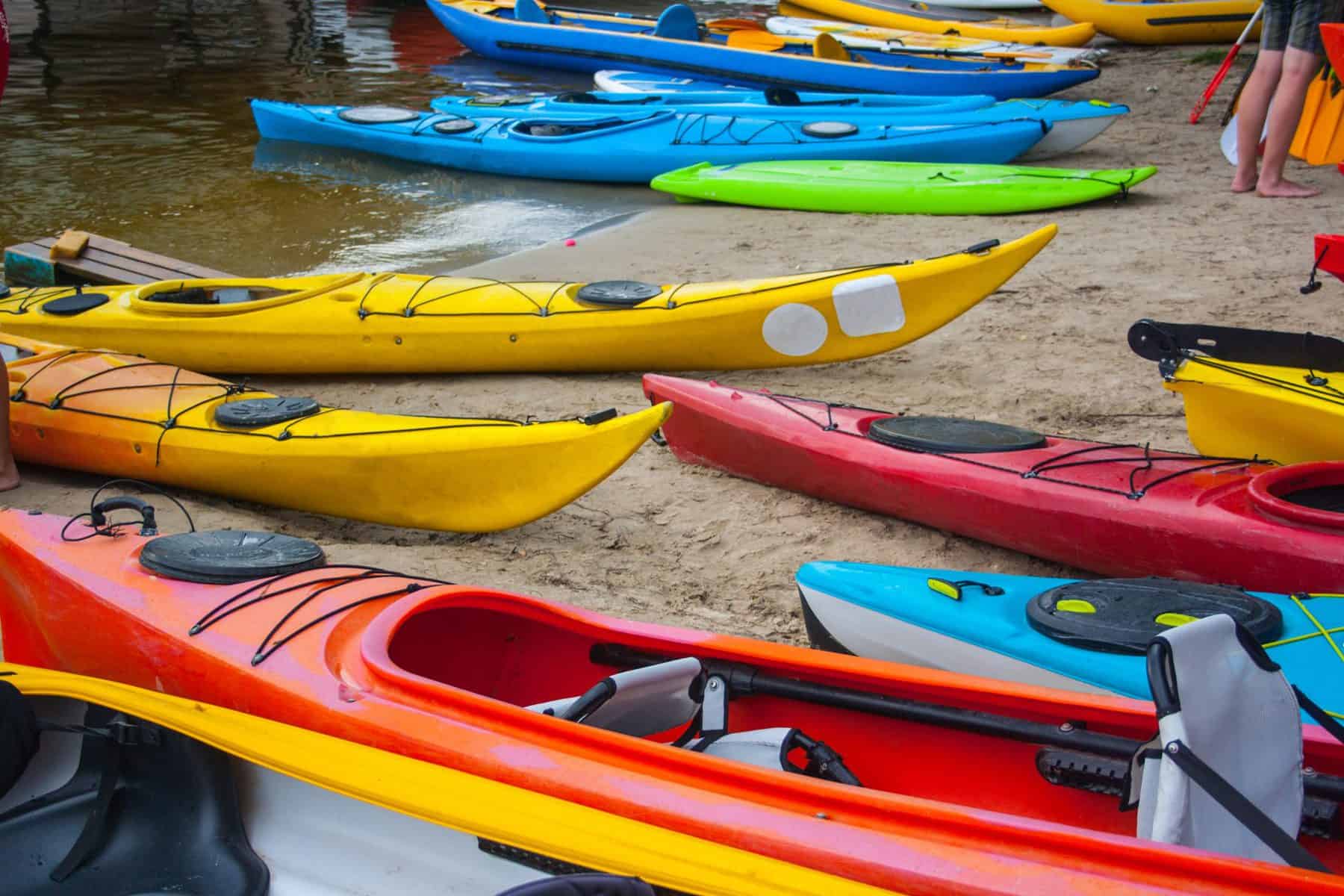 Different type of kayaks on beach