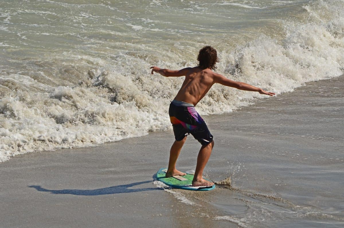 Skim Board ride wave