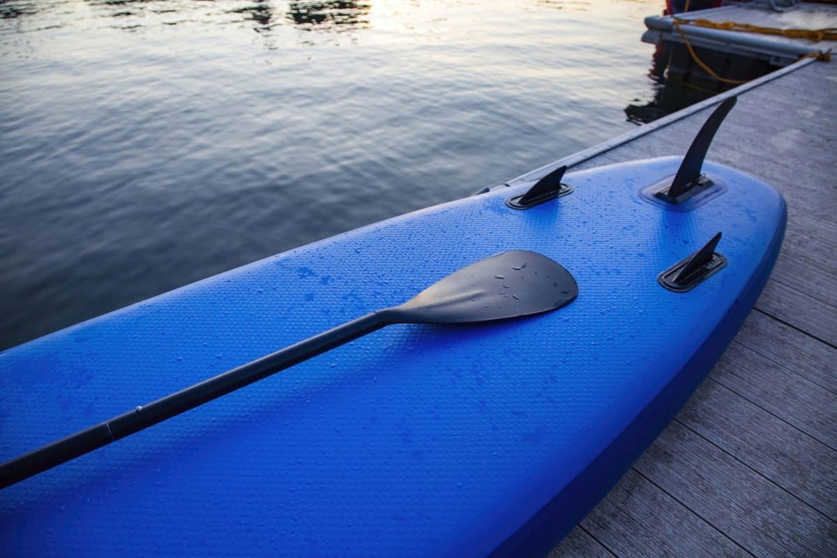 Stand up paddle sitting on dock