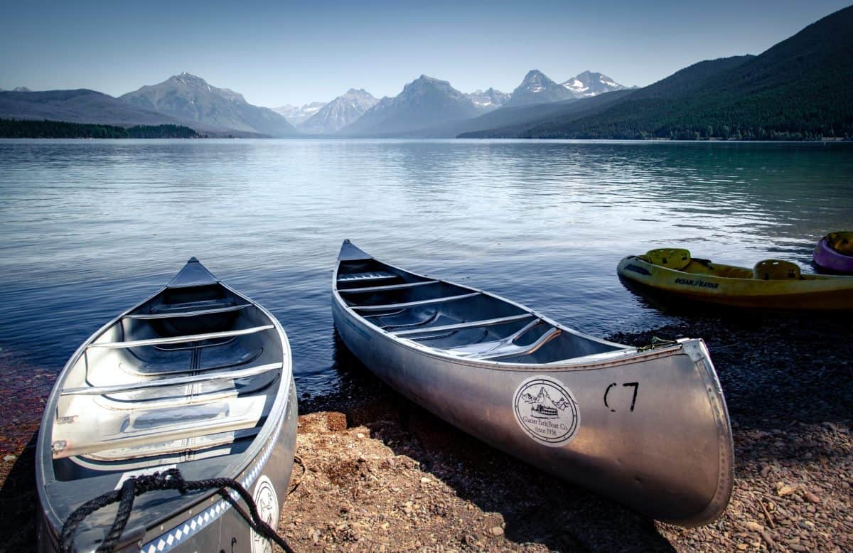 aluminum canoes on shore line