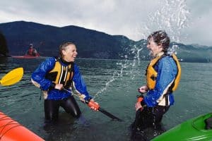 Two women playing with the Best Kayak Bilge Pump