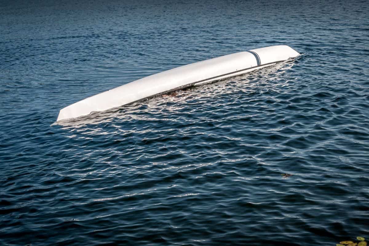 Upside down wet exit in a kayak