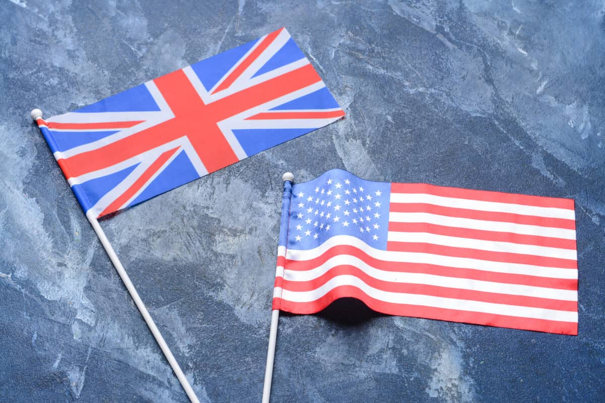 Flags of USA and Great Britain on color background - WaterSportsWhiz & UkWaterSports the merge