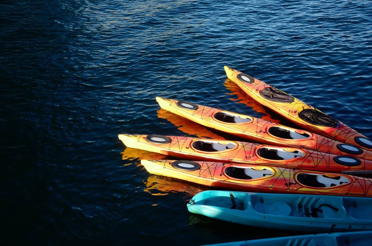 Collection of big guy kayaks on the water